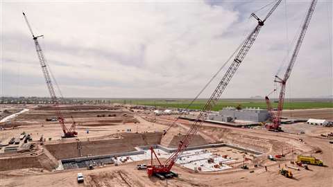 red crawler cranes on site in Chandler